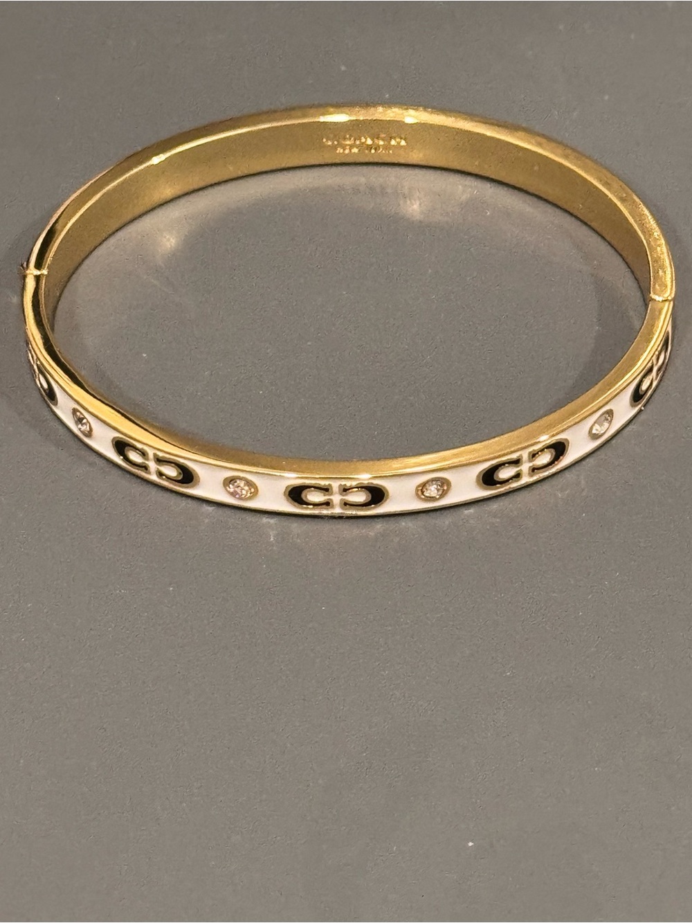 Coach Kissing C Enamel Rhinestone Hinge Bangle Bracelet Gold White NIP